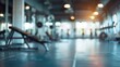 © TheWaterMeloonProjec - Blurred gym background with exercise equipment empty for text