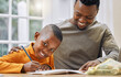 © DavisShared/peopleimages.com - Black family, boy and father for homework in portrait, helping and writing notes on lesson. Daddy, child and support for learning at table or son for education and study, assignment and project