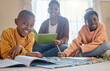 © peopleimages.com - Black family, portrait and teaching children education, home and books for studying information. Mother, kids and support for practice writing on floor, learning and homework activity for lesson