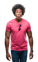 Poster - Afro american man over isolated background making fish face with lips, crazy and comical gesture. Funny expression.