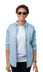 Wall Mural - Beautiful young african american woman wearing sunglasses over isolated background with a happy and cool smile on face. Lucky person.