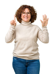 Sticker - Beautiful middle ager senior woman wearing turtleneck sweater and glasses over isolated background showing and pointing up with fingers number six while smiling confident and happy.