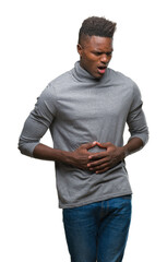 Poster - Young african american man over isolated background with hand on stomach because indigestion, painful illness feeling unwell. Ache concept.