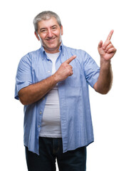 Sticker - Handsome senior man over isolated background smiling and looking at the camera pointing with two hands and fingers to the side.