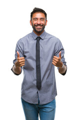 Canvas Print - Adult hispanic business man over isolated background success sign doing positive gesture with hand, thumbs up smiling and happy. Looking at the camera with cheerful expression, winner gesture.