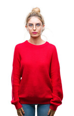 Poster - Young beautiful blonde woman wearing red sweater and glasses over isolated background with serious expression on face. Simple and natural looking at the camera.