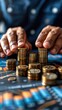 © BoOm - Close-up of hands stacking gold coins on financial charts, symbolizing wealth management, investment, and financial growth.