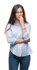 Poster - Young asian business woman wearing glasses over isolated background looking stressed and nervous with hands on mouth biting nails. Anxiety problem.