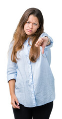 Canvas Print - Young beautiful brunette business woman over isolated background looking unhappy and angry showing rejection and negative with thumbs down gesture. Bad expression.