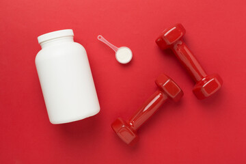 Poster - Jars with protein powder on color background, top view. Sports nutrition concept