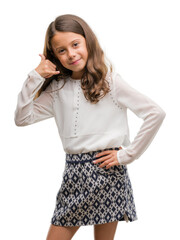 Canvas Print - Brunette hispanic girl smiling doing phone gesture with hand and fingers like talking on the telephone. Communicating concepts.