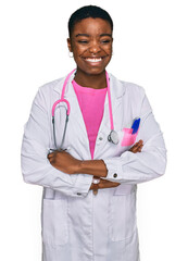 Poster - Young african american woman wearing doctor uniform and stethoscope happy face smiling with crossed arms looking at the camera. positive person.