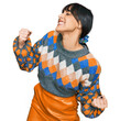© Krakenimages.com - Young hispanic woman wearing casual clothes very happy and excited doing winner gesture with arms raised, smiling and screaming for success. celebration concept.