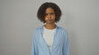 © Krakenimages.com - A beautiful young african american woman with curly hair appears thoughtful and serious over an isolated white background wall.