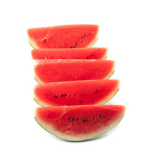 Wall Mural - Watermelon pieces isolated. Water melon wedges pile, chopped Citrullus lanatus, red wassermelone cuts group