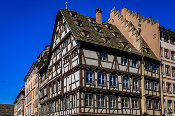 Poster - Ornate traditional half timbered houses with steep roofs in the old town of Grande Ile, the historic center of Strasbourg, Alsace, France