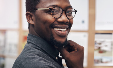 Canvas Print - Happy, glasses and portrait of black man in office with positive attitude for career at architecture startup. Smile, pride and professional architect with design engineering project in workplace.