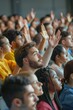 © vefimov - A crowd of people are in a room, with some of them raising their hands. Scene is one of excitement and anticipation, as if they are waiting for something important to happen