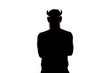 © serikbaib - silhouette of a demon with horns on a white background