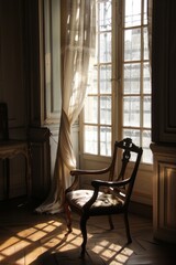 Old vintage chair in the interior of the house with a window and curtains