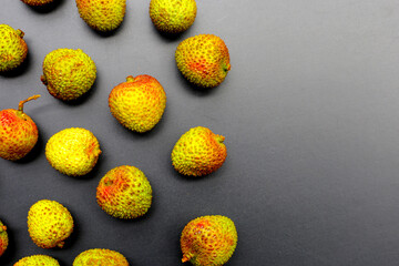 Wall Mural - Fresh lychee fruit on white background. Juicy exotic fruit.