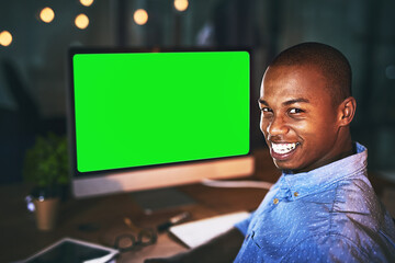 Leinwandbilder - Happy businessman, portrait and night with green screen on computer for web design or creative startup at office. Man or employee working late on technology with smile for deadline on mockup space