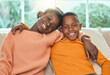 © peopleimages.com - Black kids, hug and home portrait for love in relationship, together and support in childhood. Children, siblings and embrace for security in connection, trust and relax in living room for care