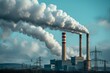 © anatolir - Industrial smokestacks emitting pollution and contributing to climate change and ecological damage in an urban setting