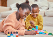 © peopleimages.com - Kids, playing and building blocks in home for growth, child development and learning for motor skills. African children, toys and colorful puzzle in education, skill and cognitive ability for bonding