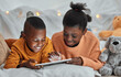 © peopleimages.com - Black kids, tablet and streaming video in home, happiness and relax together for cartoon in bedroom. Children, siblings and internet for online gaming on bed, entertainment and subscription for media