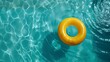 © AhmadTriwahyuutomo - Yellow Inflatable Ring in a Pool