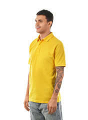 Canvas Print - Handsome young man in stylish yellow t-shirt on white background