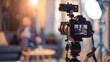 © kimly - A professional video interview setup with lighting and a camera on a tripod.