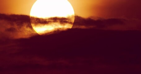 Wall Mural - time lapse of clouds over sunset