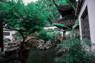 Close up detail of Chinese ancients building, garden environment and interior view.