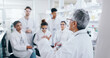 © peopleimages.com - Presentation, research and team of scientists in laboratory with mentor for bio medical internship. Question, discussion and pharmaceutical science students with lecturer for experiment or discovery.