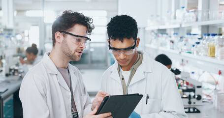 Wall Mural - Tablet, team and scientists in laboratory with research for pharmaceutical innovation experiment. Collaboration, discussion and male medical science students on digital technology for biology data.