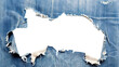 © Yeti Studio - Large hole in worn blue denim fabric with frayed edges, cut out