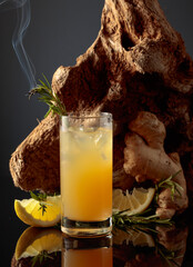 Wall Mural - Lemon and ginger iced drink with rosemary.