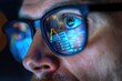 © Olena - Eye Charts. Trader Analyzing Stock Exchange Data with Reflection in Eyeglasses