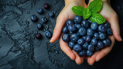 acai berries held in hand