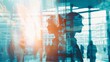 © touseef - Silhouette of business professionals collaborating in a modern office environment with double exposure of network connections, symbolizing teamwork, partnership, and corporate success