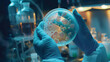 © Mahemud - A scientist wearing blue rubber gloves holding a Petri dish containing a culture of unusual bacteria in a microbiology laboratory. This scene illustrates the concept of an epidemic and microbiological