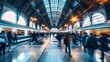 © touseef - Bustling train station with blurred motion of commuters and travelers during rush hour, capturing the busy urban lifestyle and transportation dynamics in a modern city