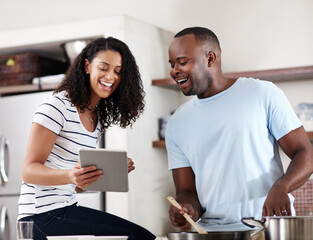 Wall Mural - House, kitchen and couple with tablet for cooking, recipe website and instructions of food dish. Interracial marriage, man cook and woman with digital for online ingredients, browse and laugh in home