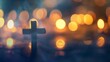© Vincent - Wooden Christian Cross out of focus with a soft bokeh lights background