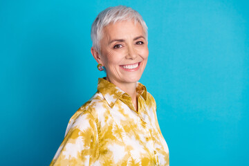 Sticker - Photo portrait of attractive senior woman look camera cheerful dressed stylish elegant clothes isolated on blue color background