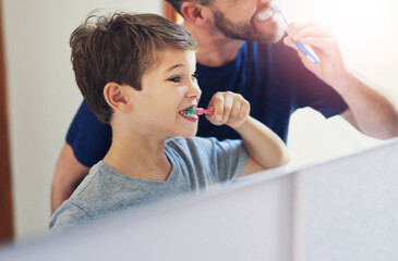 Sticker - Dad, family and child brushing teeth in mirror with dental hygiene, cleaning and support at home. Father, man or parent with boy or kid learning of mouth and oral health with toothpaste in bathroom