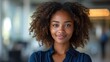 © AIproduction - Radiant Smile: Young African American Businesswoman in Office