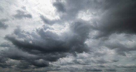 Wall Mural - dark sky with stormy clouds. dramatic sky rain,dark clouds before a thunder-storm.